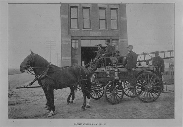 Black firefighters on their horse and carriage. Labeled Hose Company No. 11